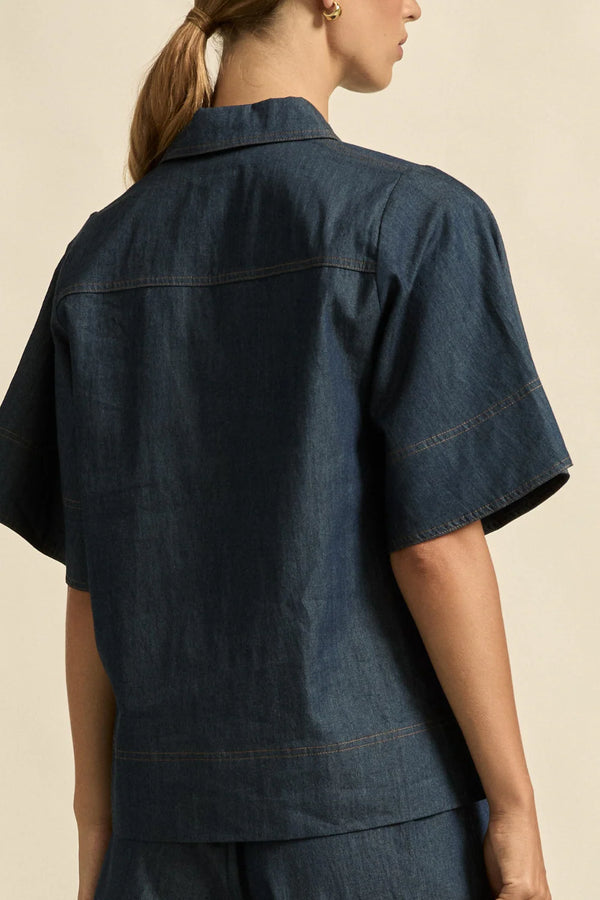 INSINUATE TOP DARK CHAMBRAY